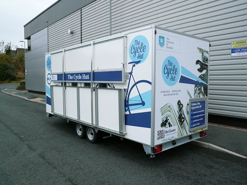 closed 5.5mt cycle hut trailer with graphics